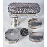 A Glass Trinket Box with Silver Lid together with 4 Silver Pill Boxes and a Silver Condiment.