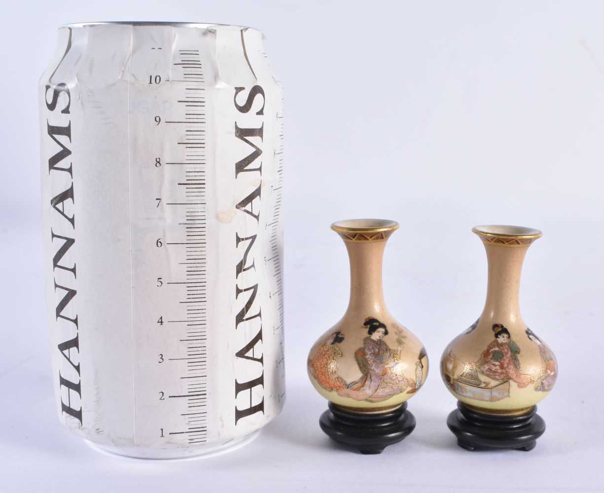 A RARE MINIATURE PAIR OF LATE 19TH CENTURY JAPANESE MEIJI PERIOD SATSUMA VASES painted with