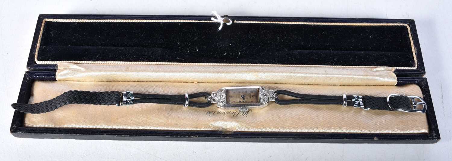 J W Benson, Art Deco ladies platinum cocktail manual wristwatch set with 10 diamonds, with box, dial
