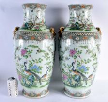 A VERY LARGE PAIR OF 19TH CENTURY CHINESE FAMILLE VERTE PORCELAIN VASES Qing, painted with birds