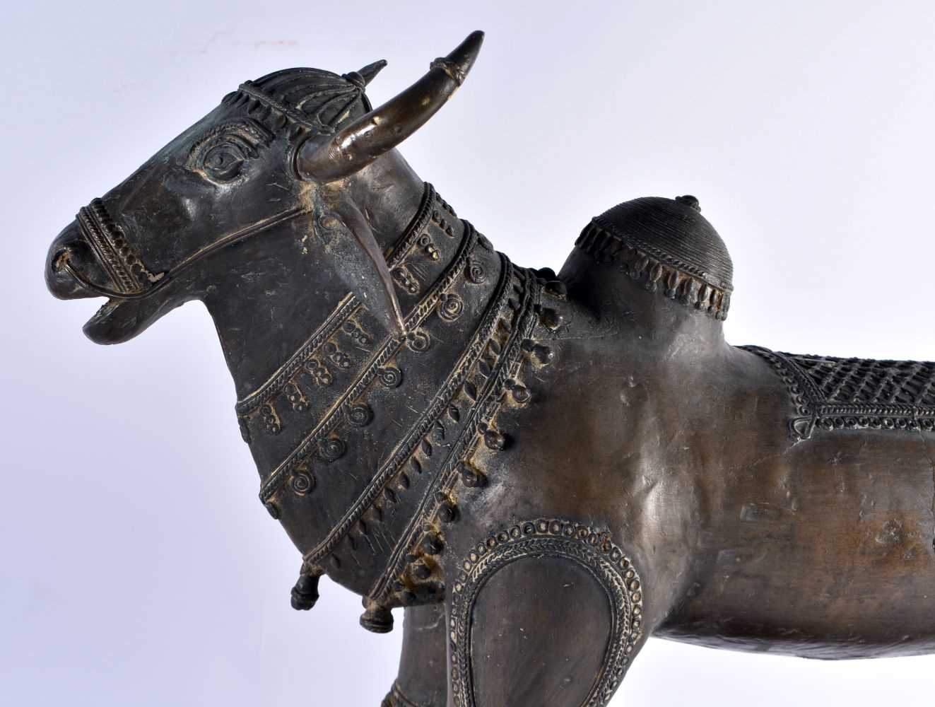 A LARGE DHOKRA BRONZE SCULPTURE OF A HOLY COW. Orissa (Odisha), Eastern India, 18th - 19th - Image 2 of 4