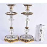 A FINE PAIR OF EARLY 19TH CENTURY CONTINENTAL BRONZE AND ROCK CRYSTAL CANDLESTICKS French of