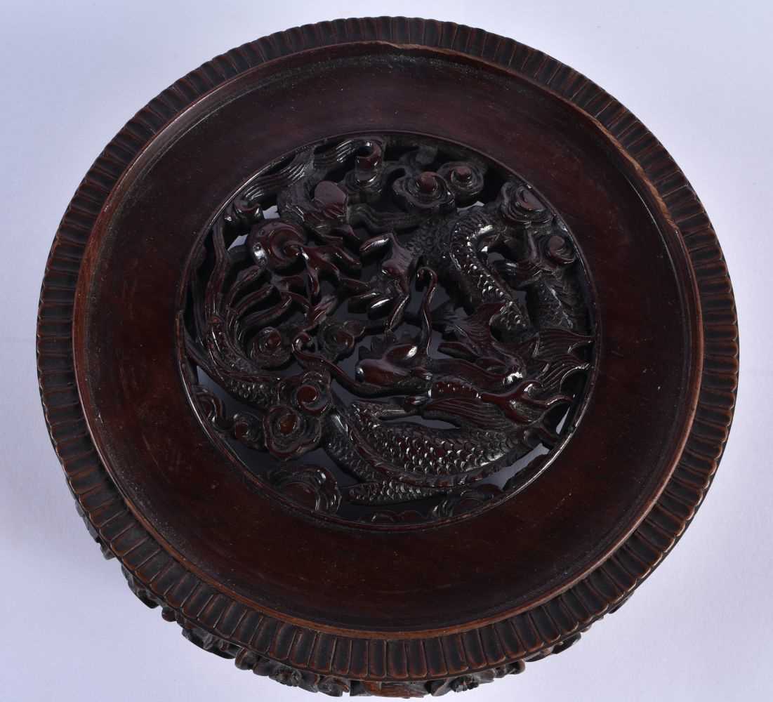 A FINE EARLY 19TH CENTURY CHINESE CARVED HARDWOOD DRAGON STAND Qing, beautifully carved with a - Image 4 of 14