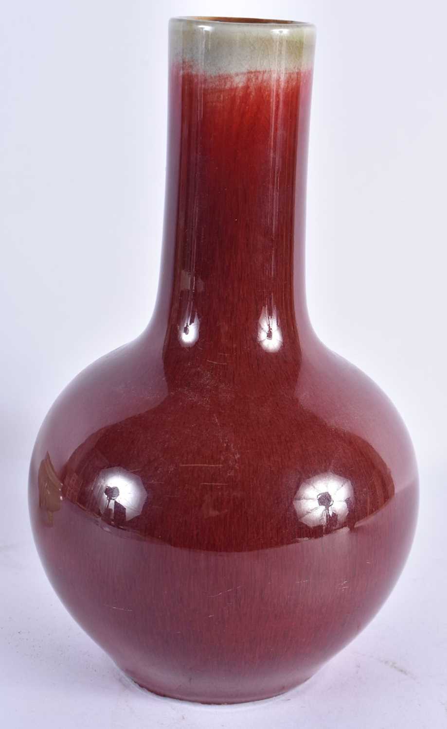 A 19TH CENTURY CHINESE SANG DU BOEUF PORCELAIN VASE bearing Qianlong marks to base, together with - Image 3 of 9