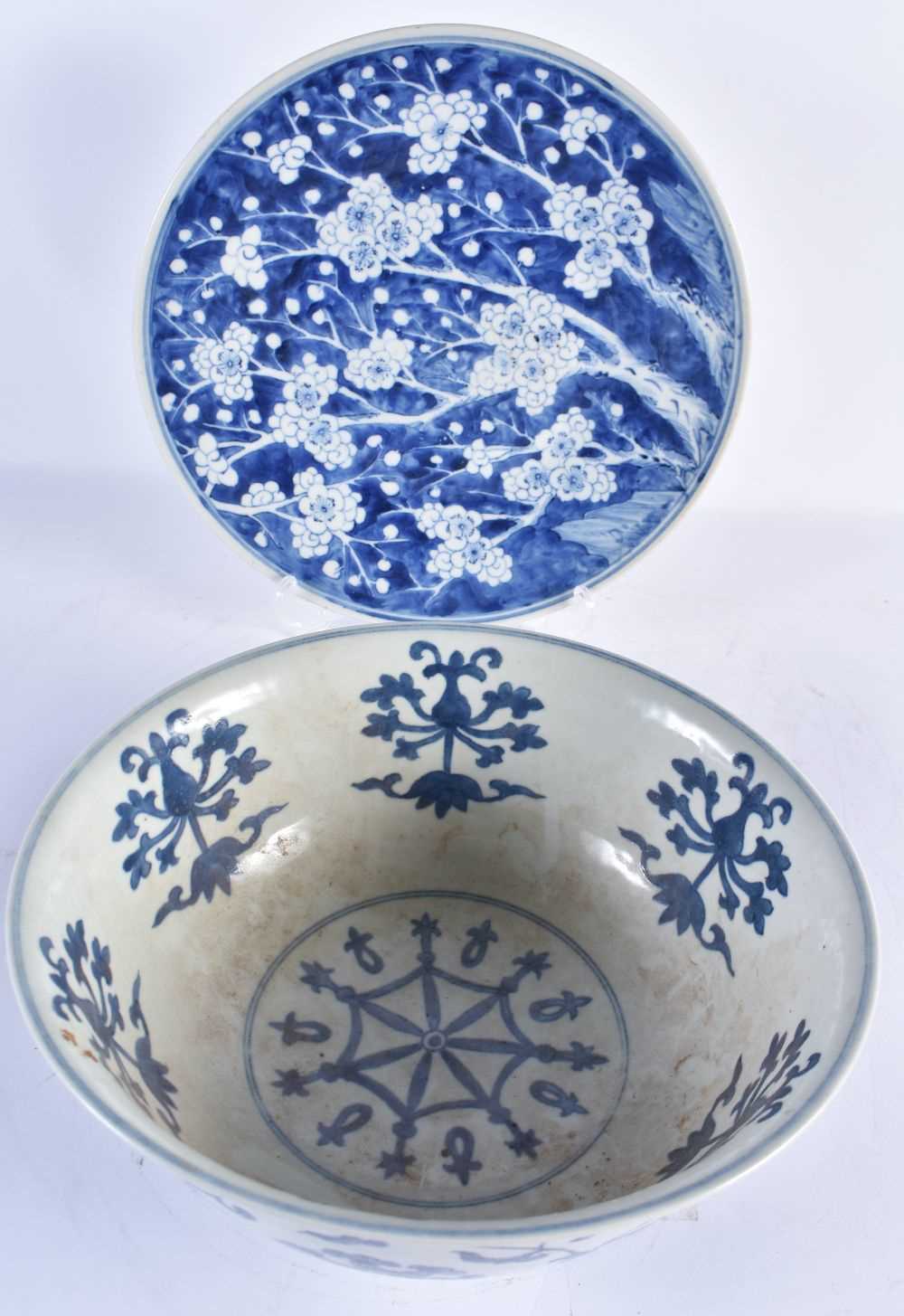 A LARGE 19TH CENTURY CHINESE BLUE AND WHITE PORCELAIN PRUNUS DISH Qing, together with a blue and