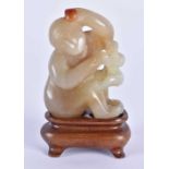 A LOVELY 19TH CENTURY CHINESE CARVED JADE FIGURE OF A MONKEY Qing, modelled with a smaller monkey. 7