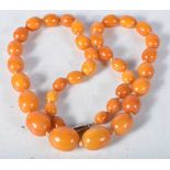 Bakelite graduated necklace individually knotted. 5cm long, weight 38g, largest bead 15mm