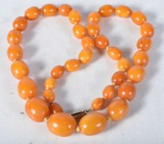 Bakelite graduated necklace individually knotted. 5cm long, weight 38g, largest bead 15mm