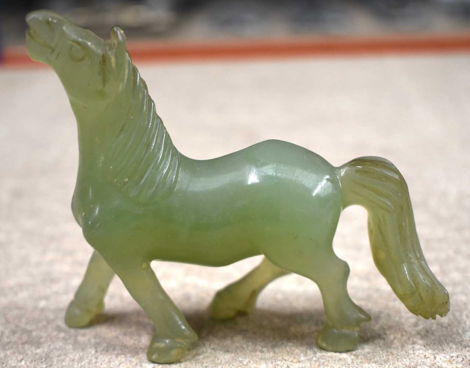 A SET OF SIX LATE 19TH CENTURY CHINESE CARVED JADE HORSES Late Qing, modelled in various forms and - Image 40 of 46