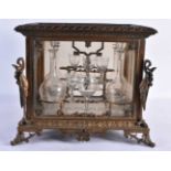 A LARGE MID 19TH CENTURY FRENCH BRONZE AND CRYSTAL GLASS TANTALUS decorated with mythical beasts and