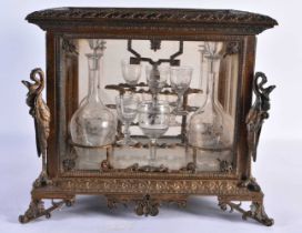 A LARGE MID 19TH CENTURY FRENCH BRONZE AND CRYSTAL GLASS TANTALUS decorated with mythical beasts and