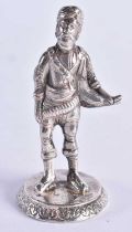 A RARE 19TH CENTURY CAST SILVER FIGURE OF AN INDIAN MAHARAJA bearing Bishops Mitre crest to base. 65