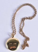 A 9 Carat Gold Locket (takes 4 pictures) on chain. Stamped 9K, 2.7cm diameter, total weight 11.4g.