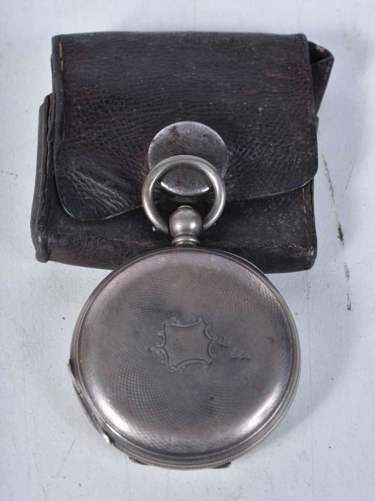 A Miniature Silver Half Hunter Pocket Watch with Black Enamel Numerals on Case in a Leather Pouch. - Image 2 of 3