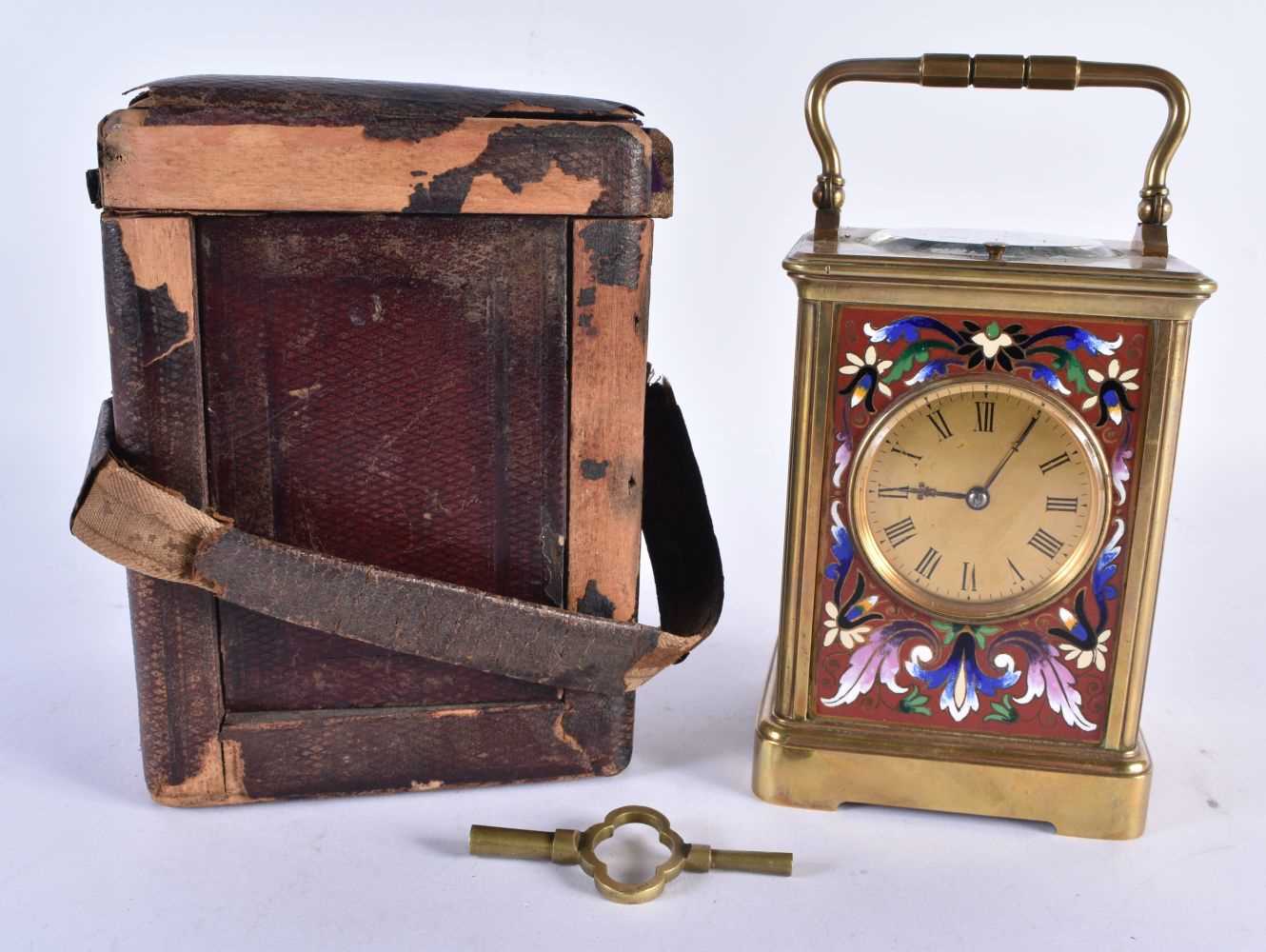 A LATE 19TH CENTURY FRENCH REPEATING CHAMPLEVE ENAMEL CARRIAGE CLOCK within original leather