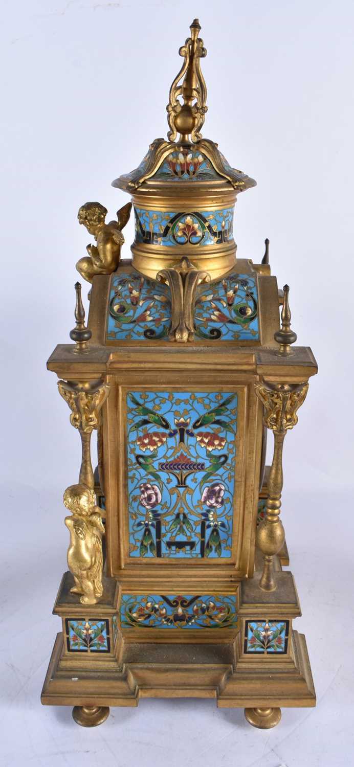A FINE 19TH CENTURY FRENCH ORMOLU AND CHAMPLEVE ENAMEL CLOCK GARNITURE formed with putti amongst - Image 7 of 9