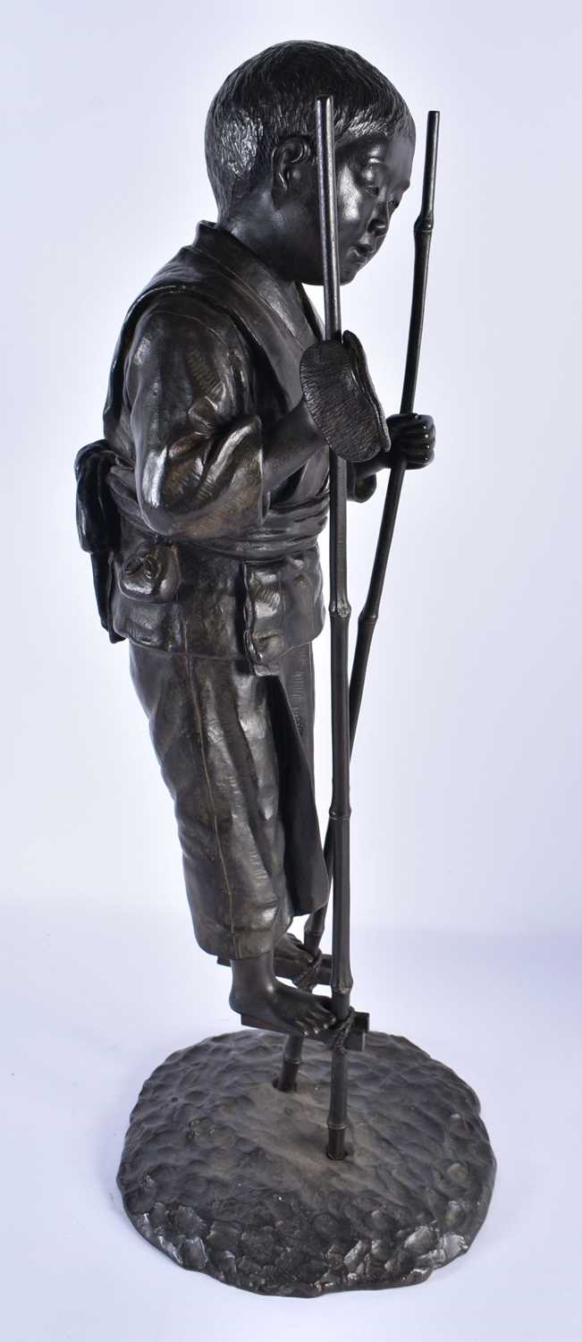A LARGE 19TH CENTURY JAPANESE MEIJI PERIOD BRONZE OKIMONO modelled as a young boy walking on stilts. - Image 5 of 6
