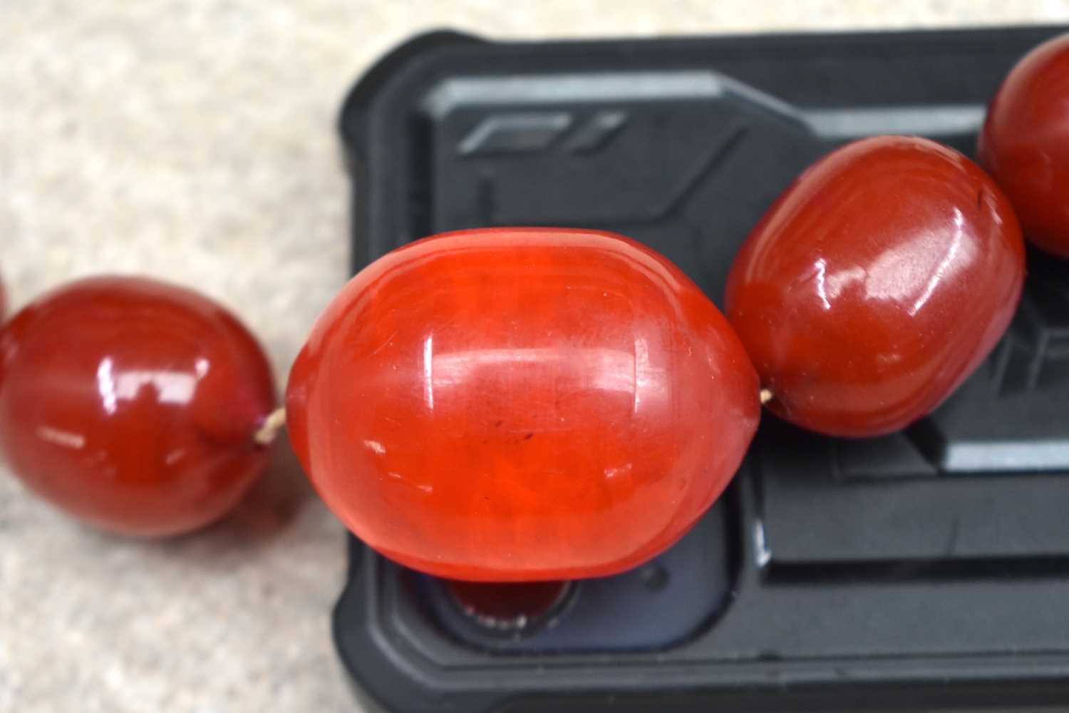 Cherry Bakelite graduated necklace with internal streaking. 99cm long, largest bead 30mm (165g) - Image 6 of 7