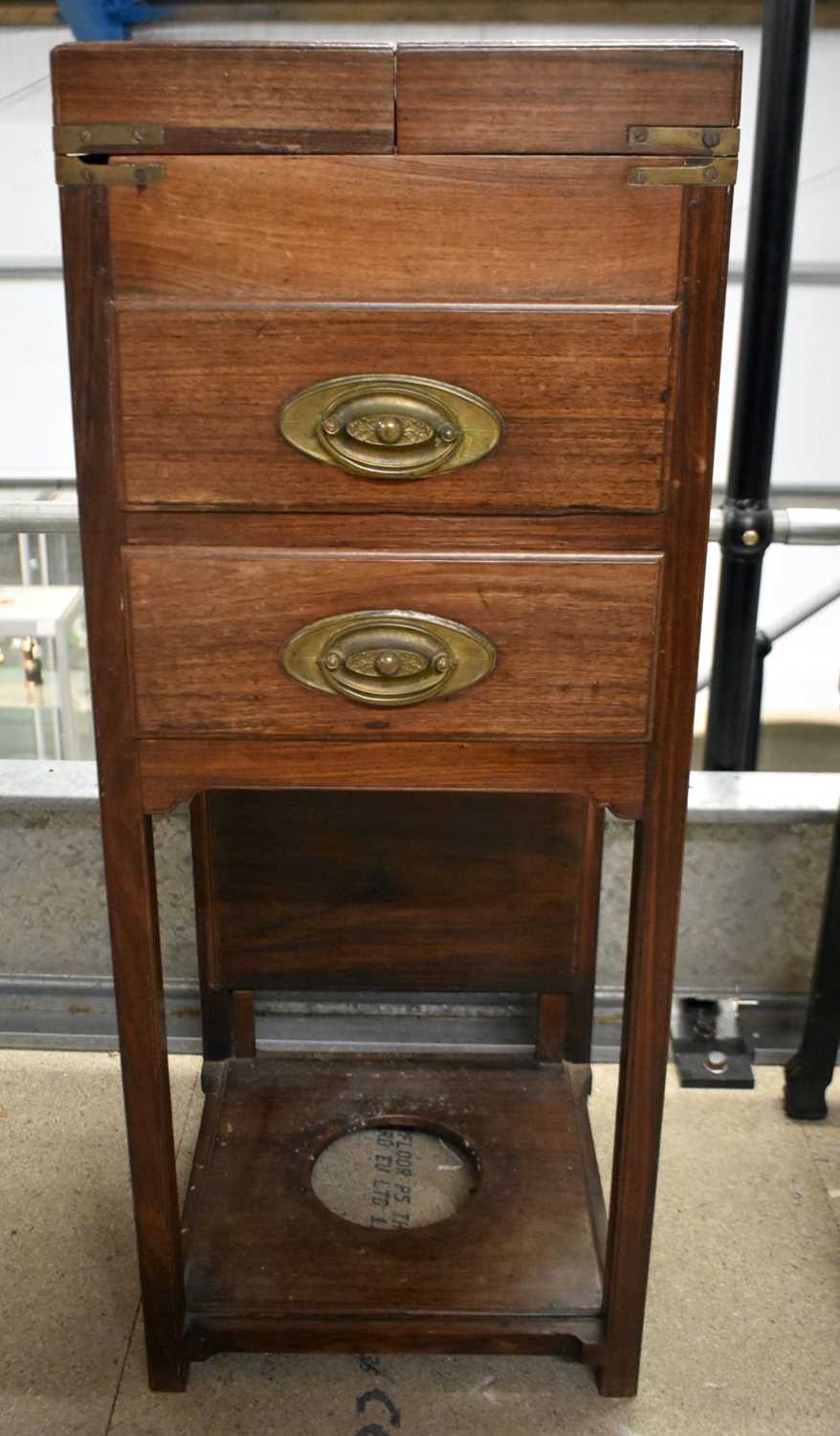 A RARE 19TH CENTURY ANGLO CHINESE CARVED HARDWOOD CAMPAIGN STYLE WASH STAND. 95 cm x 38 cm.