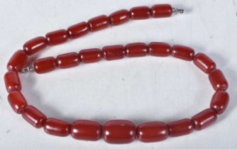 Cherry Bakelite graduated necklace with screw clasp. 41cm long, largest bead 9mm, weight 30g