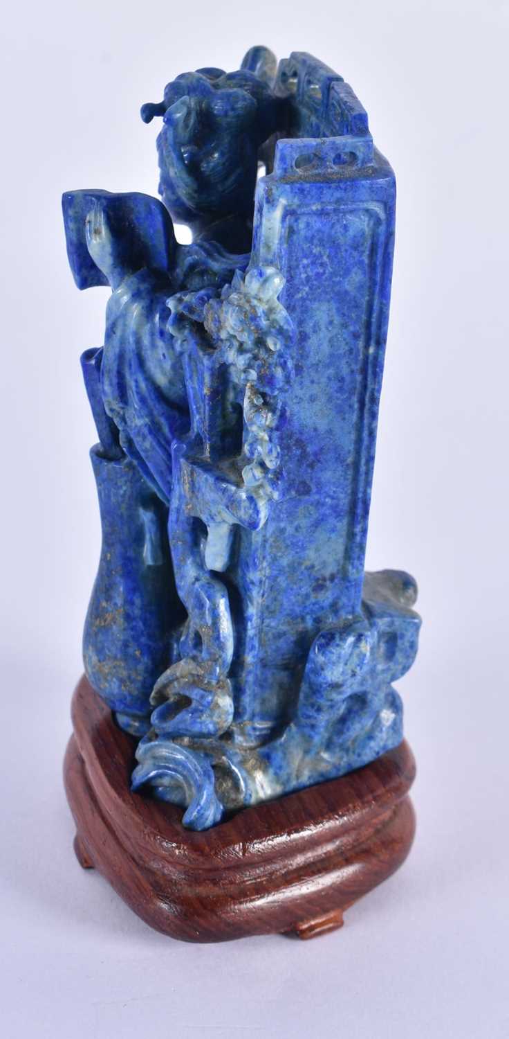 A LATE 19TH CENTURY CHINESE CARVED LAPIS LAZULI FIGURE OF A FEMALE Late Qing, modelled standing - Image 2 of 5