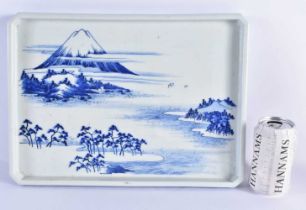 A 19TH CENTURY JAPANESE MEIJI PERIOD BLUE AND WHITE PORCELAIN TRAY painted with landscapes and Mt