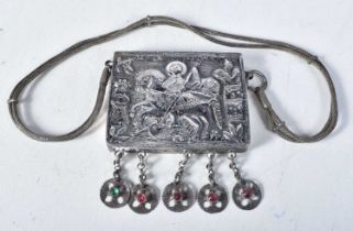 An Early Continental Silver Opium Box with Embossed Religious Scenes. 8.4cm x 6.9cm x 1cm, weight