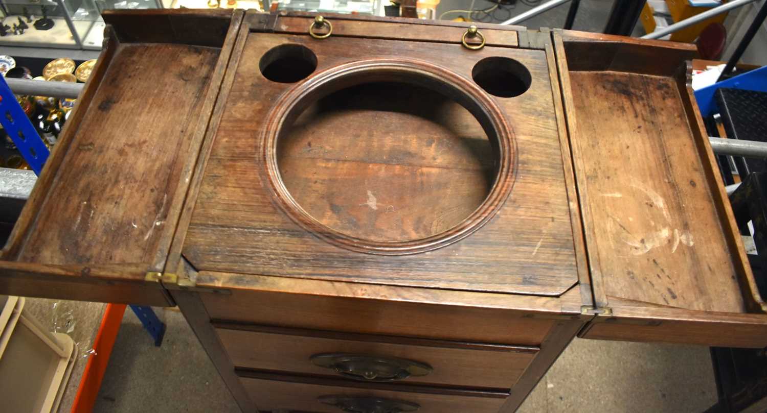 A RARE 19TH CENTURY ANGLO CHINESE CARVED HARDWOOD CAMPAIGN STYLE WASH STAND. 95 cm x 38 cm. - Image 3 of 21