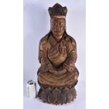 A VERY LARGE 17TH CENTURY CHINESE POLYCHROMED LACQUERED WOOD FIGURE OF A SEATED BUDDHA Late Ming,
