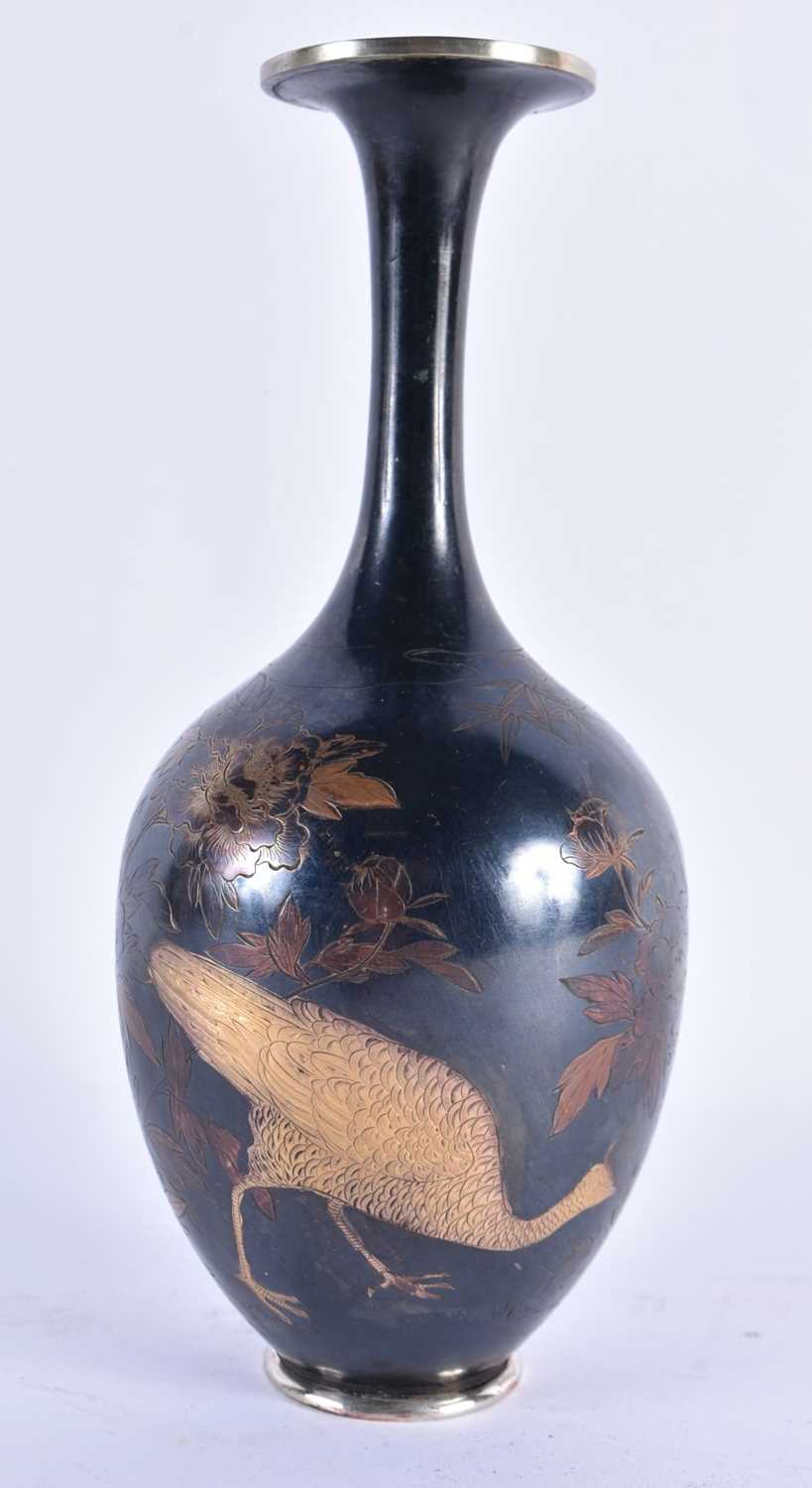 A LATE 19TH CENTURY JAPANESE MEIJI PERIOD SILVER AND SHAKUDO VASE engraved with birds and