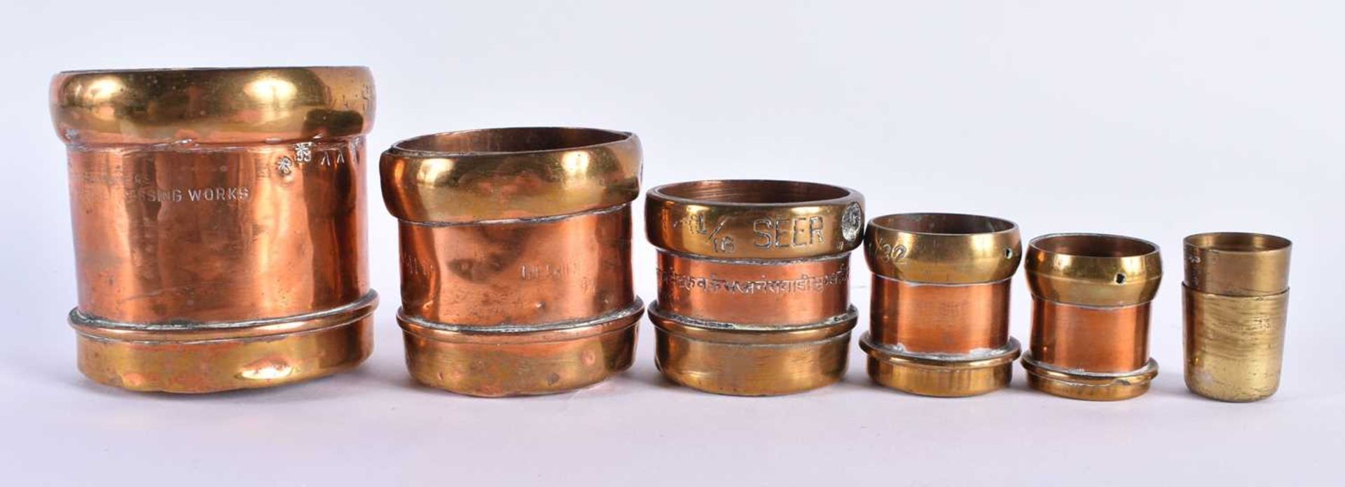 A SET OF ANTIQUE COPPER AND BRASS MEASURES stamped Punjab Metal Works. Largest 17 cm x 17 cm. (qty) - Image 9 of 11