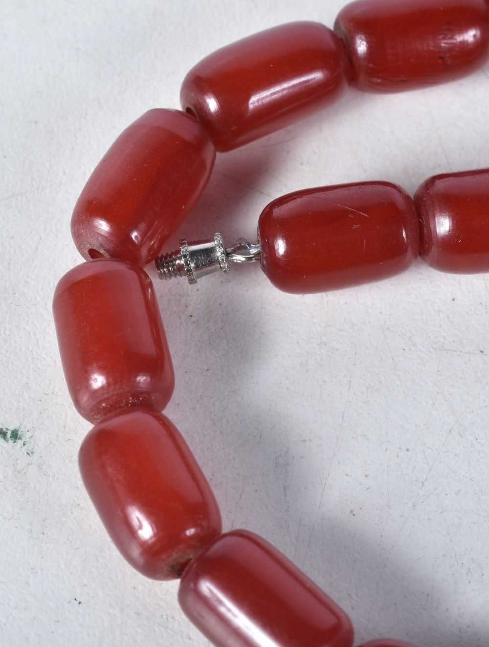 Cherry Bakelite graduated necklace with screw clasp. 41cm long, largest bead 9mm, weight 30g - Image 2 of 3
