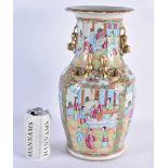 A LARGE 19TH CENTURY CHINESE CANTON FAMILLE ROSE PORCELAIN VASE Qing, painted with figures and