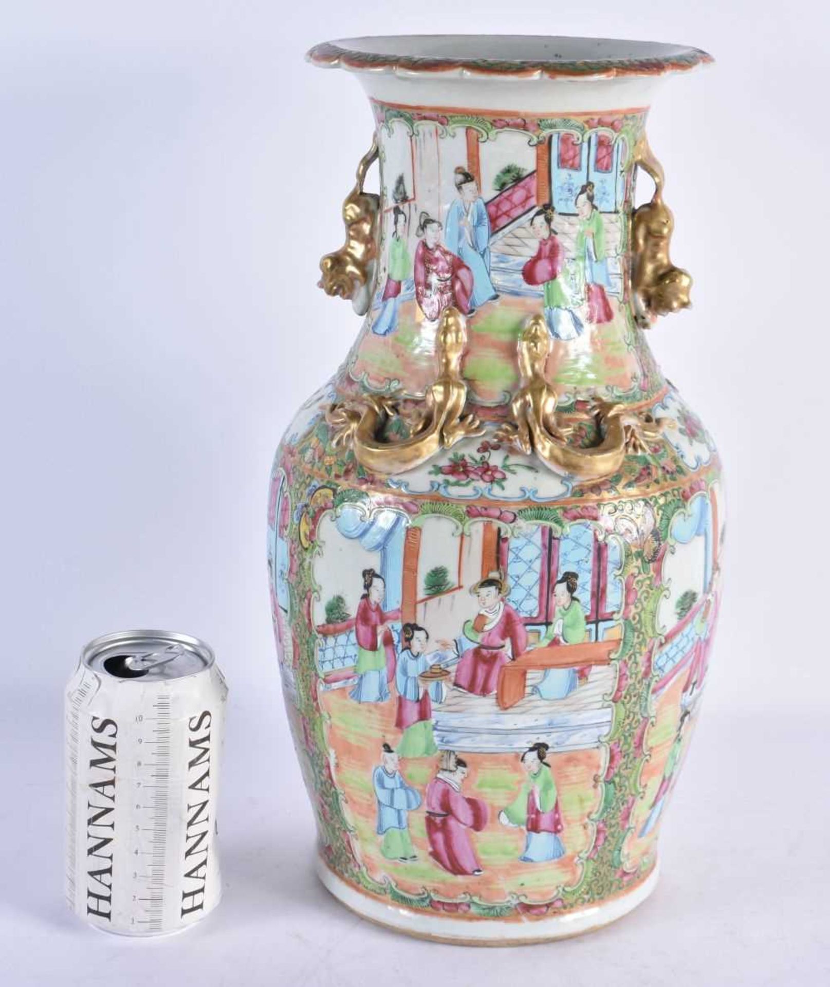 A LARGE 19TH CENTURY CHINESE CANTON FAMILLE ROSE PORCELAIN VASE Qing, painted with figures and