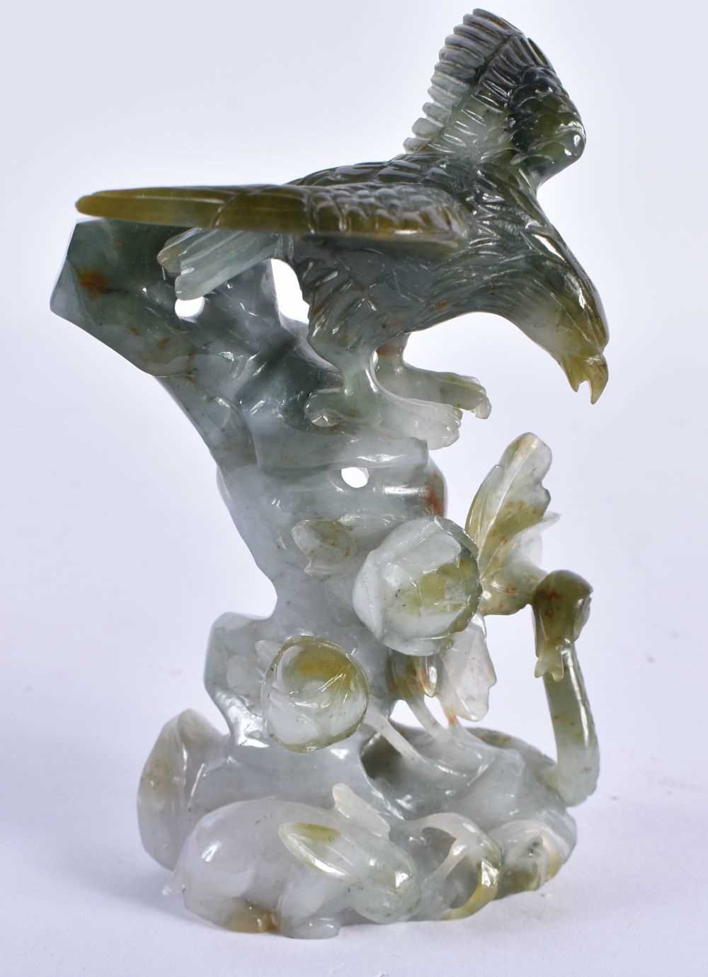 AN EARLY 20TH CENTURY CHINESE CARVED JADEITE FIGURE OF AN EAGLE Late Qing/Republic. 12 cm x 6 cm.
