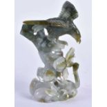 AN EARLY 20TH CENTURY CHINESE CARVED JADEITE FIGURE OF AN EAGLE Late Qing/Republic. 12 cm x 6 cm.