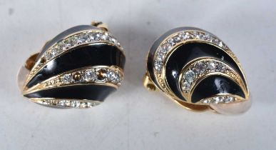 Pair of gold tone clip on earrings by designer Nina Ricci. Stamped Nina Ricci. 2.1cm x 1.6cm, weight