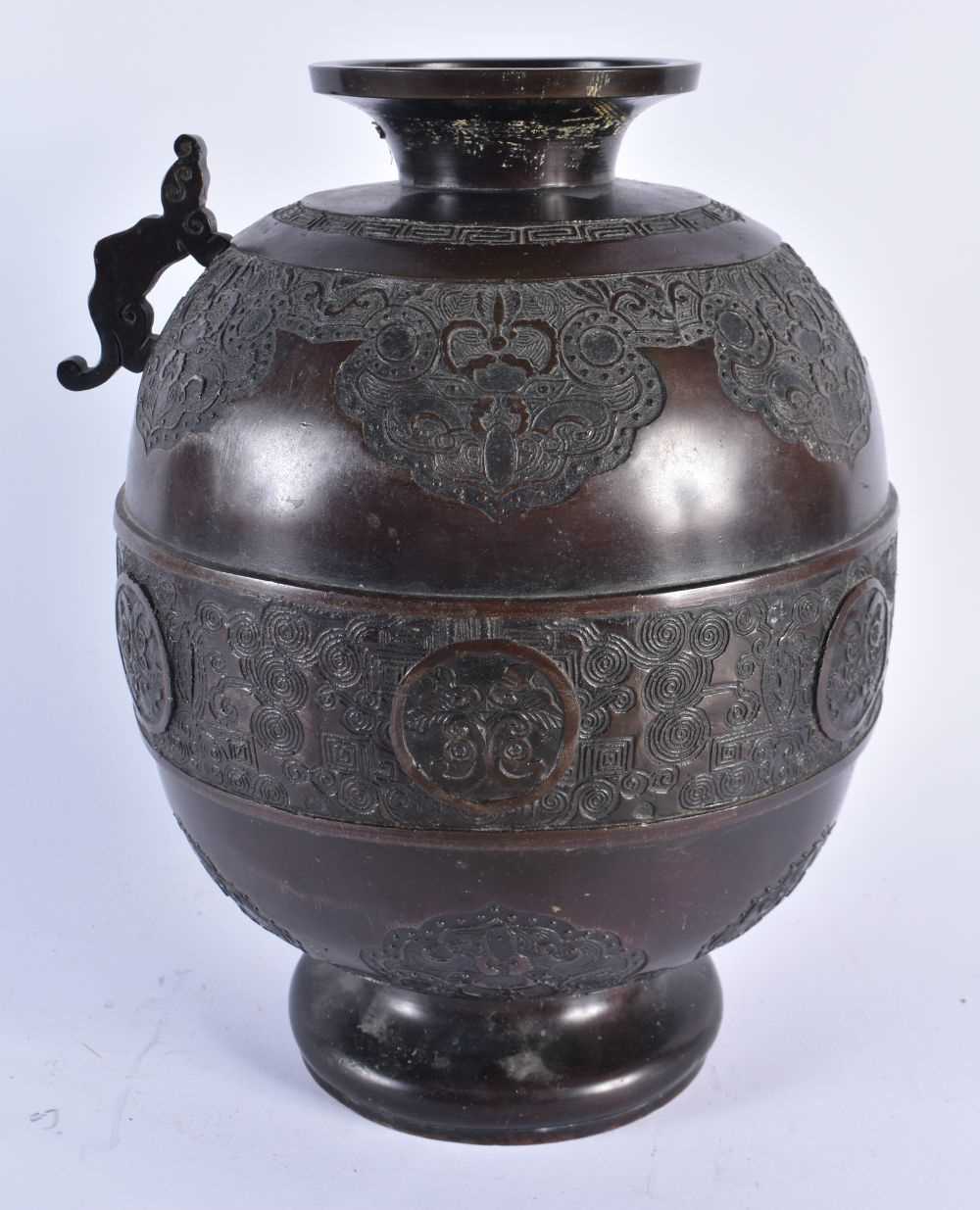 A LARGE 19TH CENTURY JAPANESE MEIJI PERIOD BRONZE VASE decorated with archaic motifs and foliage. 30 - Image 5 of 8