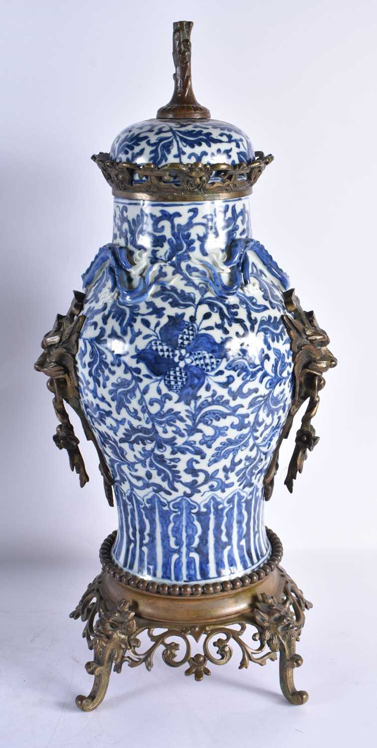 A LARGE PAIR OF 19TH CENTURY CHINESE BLUE AND WHITE BRONZE MOUNTED VASES Qing. 48 cm high. - Image 2 of 24