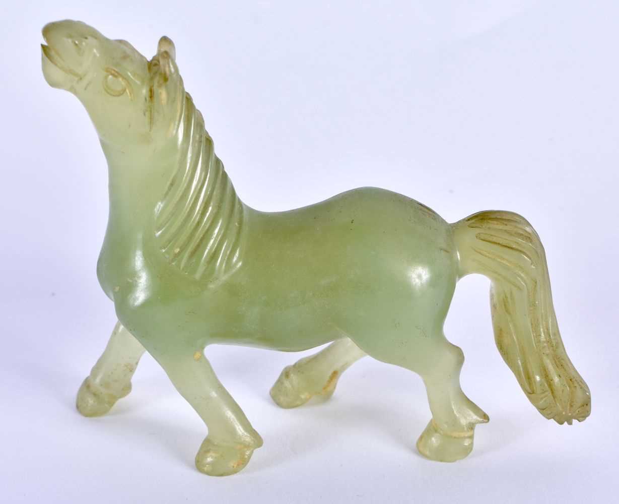 A SET OF SIX LATE 19TH CENTURY CHINESE CARVED JADE HORSES Late Qing, modelled in various forms and - Image 8 of 46