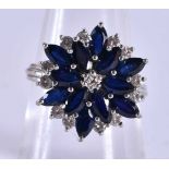 An 18 Carat White Gold, Diamond and Sapphire Cluster Ring. Stamped 750, Size P, weight 6.76g