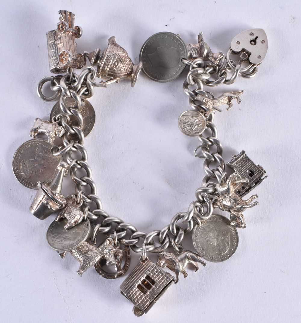 A SILVER CHARM BACELET. 74.6 grams. 20 cm wide. - Image 5 of 5
