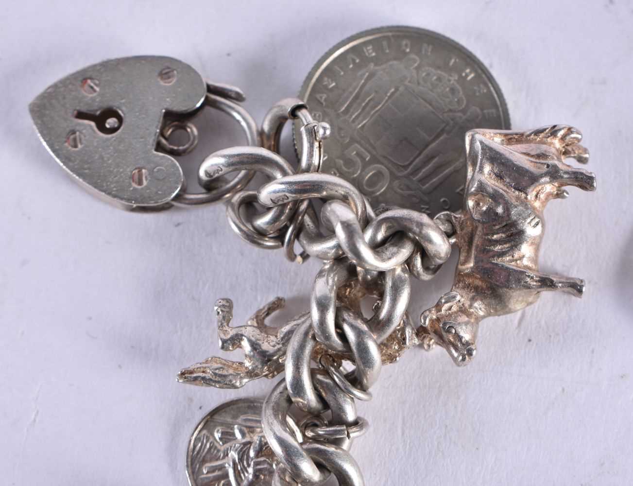 A SILVER CHARM BACELET. 74.6 grams. 20 cm wide. - Image 3 of 5