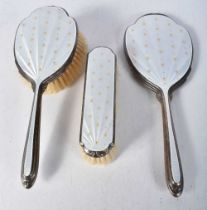 Three Silver and Enamel Dressing Table items (Hand Mirror, Hair Brush and Clothes Brush). Hallmarked