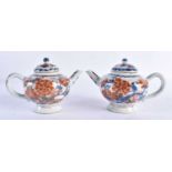 A PAIR OF LATE 17TH/18TH CENTUTYR CHINESE IMARI BLUE AND WHITE PORCELAIN TEAPOTS AND COVERS Kangxi/