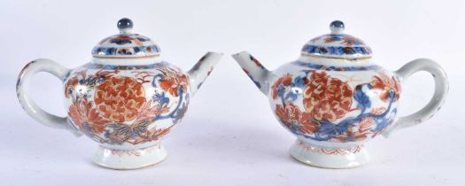 A PAIR OF LATE 17TH/18TH CENTUTYR CHINESE IMARI BLUE AND WHITE PORCELAIN TEAPOTS AND COVERS Kangxi/