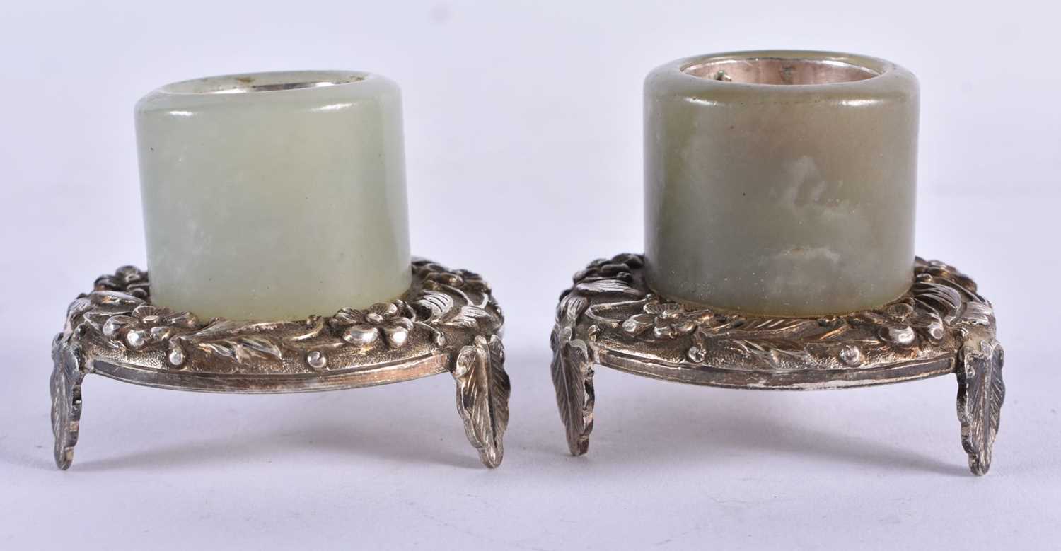 A PAIR OF CHINESE QING DYNASTY JADE ARCHERS RINGS. 103 grams. 5 cm x 4 cm.