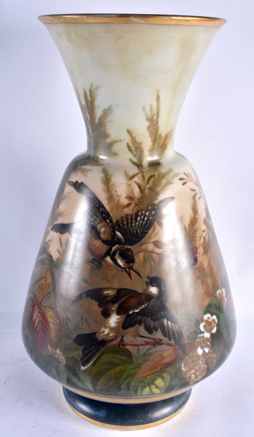 AN UNUSUAL LARGE VICTORIAN OPALINE GLASS VASE painted with birds within landscapes. 53 cm x 25 cm. - Image 5 of 9