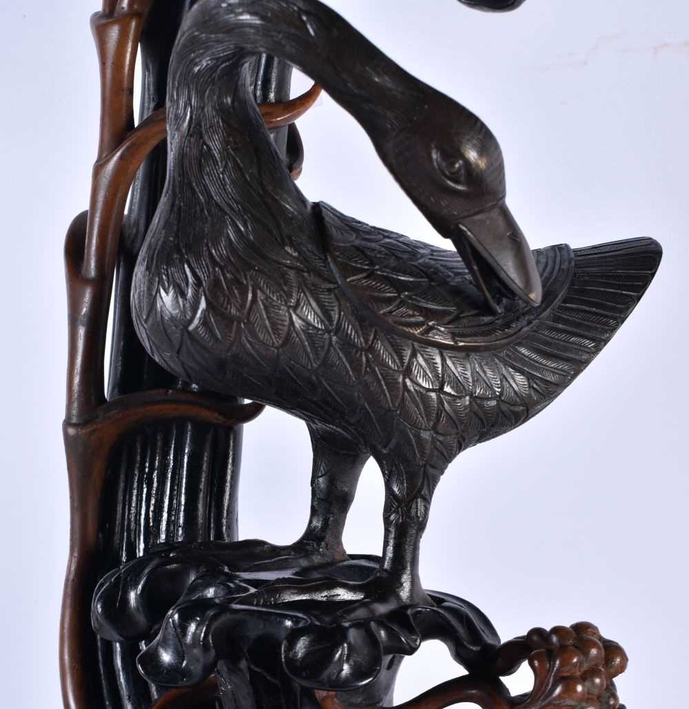 A RARE LARGE CHINESE QING DYNASTY BRONZE AND LACQUER STAND modelled as two birds, modelled upon a - Image 12 of 17