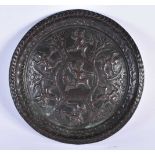 A 19TH CENTURY INDIAN BRONZE REPOUSSE DEITY DISH decorated with figures. 21 cm diameter.